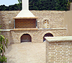 CODE 1: Barbeque compilation and bench coated with decorative brick
