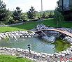 CODE 2: Construction of pond from pebbles and path creation, with small white water pebble