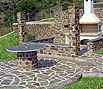 CODE 2: Stonebuit construction and barbeque, floor paving with irregular Karystou stones